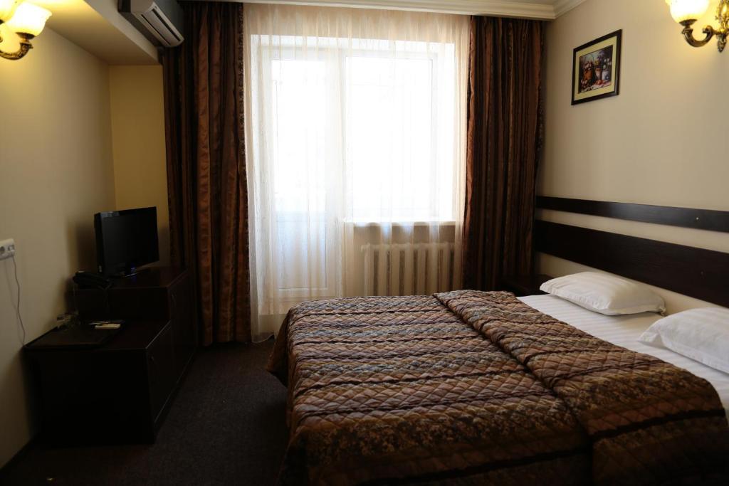 Salem On Samal Hotell Almaty Rom bilde